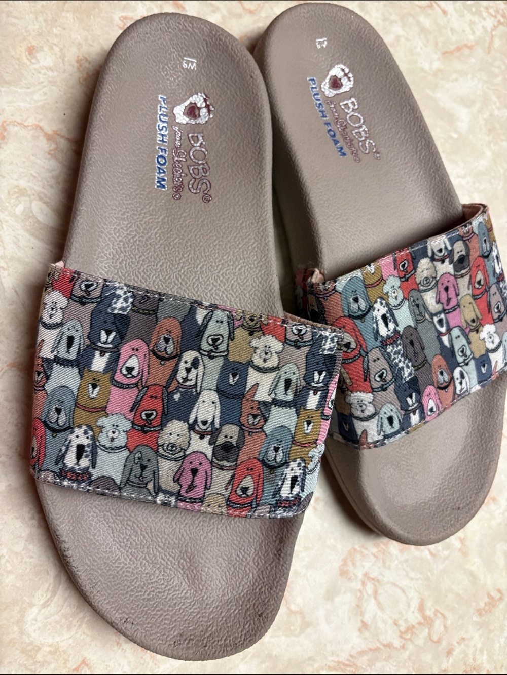 Skechers women’s Brown Slide Sandals with Multi-Color Puppy Print Strap